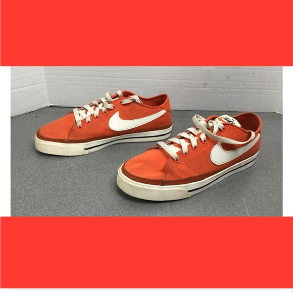 mens orange and white nike shoes